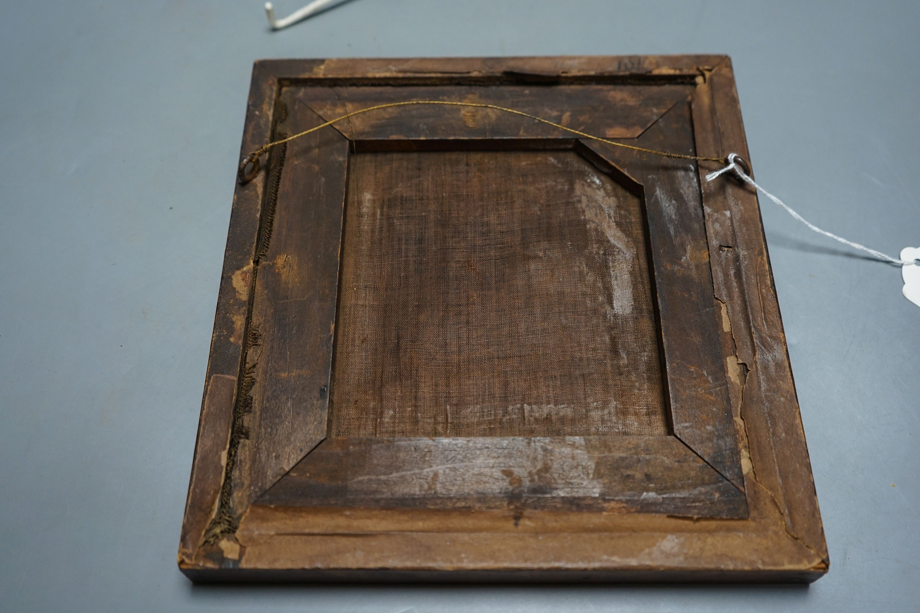 An early 19th century needlework of the Agnus Dei with the vexillum, incorporating a lamb and flag, in bird's eye maple frame 25x23cm incl frame